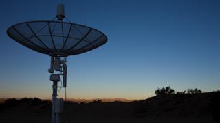 Image of a satellite dish pointing straight up